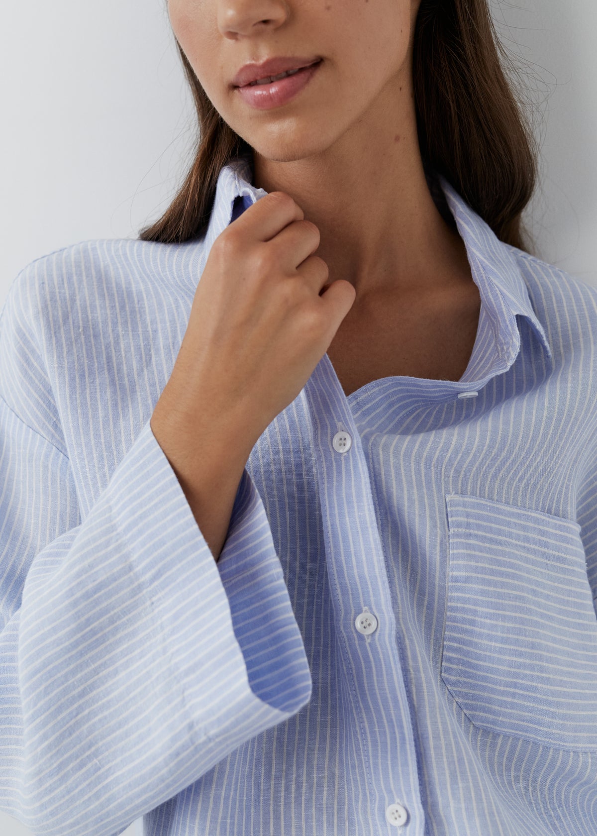 Fine striped linen pyjama shirt with river shell buttons and a chest pocket.